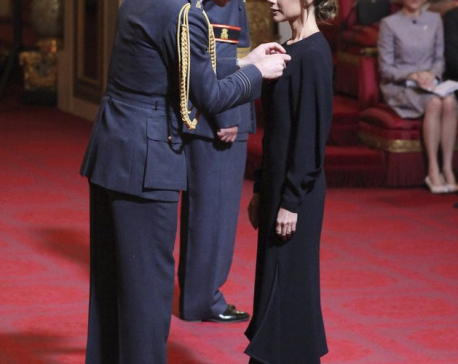 Posh day at palace: Victoria Beckham gets royal recognition